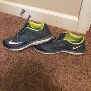 Nike gray and highlighted yellow, Mens size 7.5